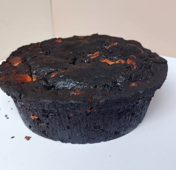 Singapore halal Black oreo blackout cookie pie on a white surface with a plain background
