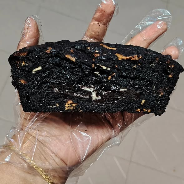 Singapore halal Black oreo blackout cookie pie on a white surface with a plain background