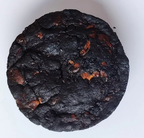 Singapore halal Black oreo blackout cookie pie on a white surface with a plain background