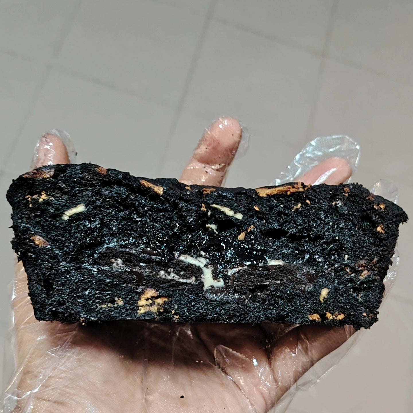 Singapore halal Black bronie oreo blackout cookie pie on a white surface with a plain background