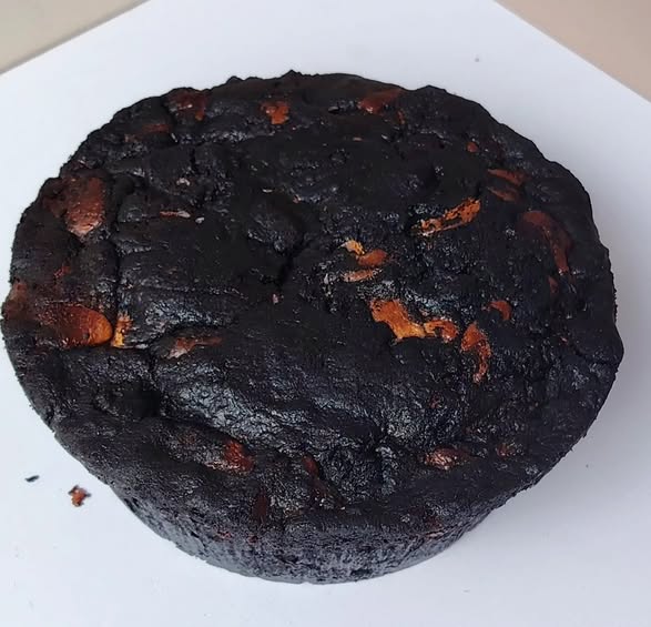 Singapore halal Black oreo blackout cookie pie on a white surface with a plain background