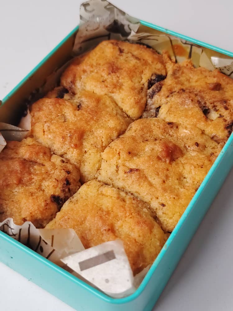 Singapore Halal Dubai Viral stuffed cookies in a tin gooey Biscuits in a teal box with a white background