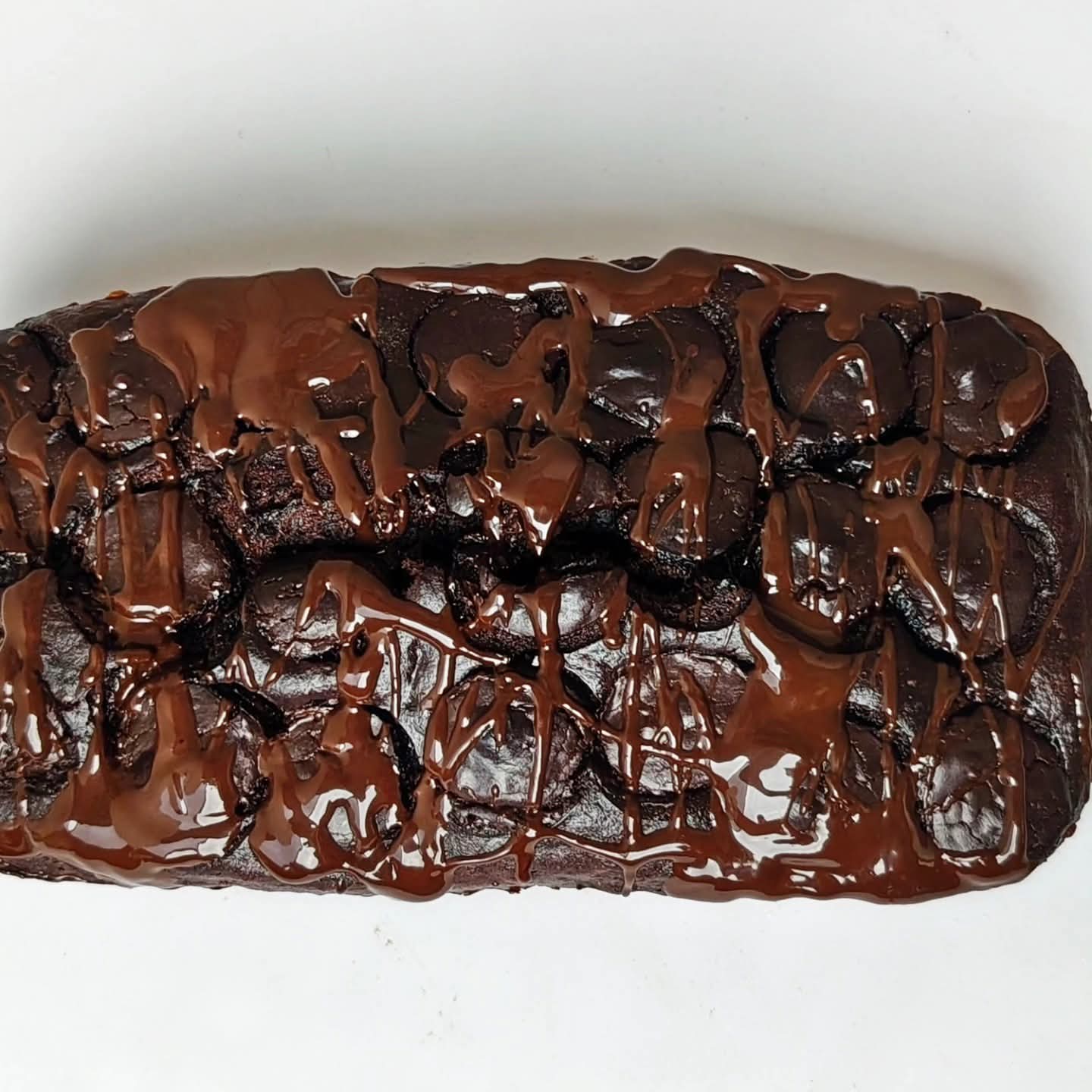 Singapore halal banana bread Chocolate dessert with a white background