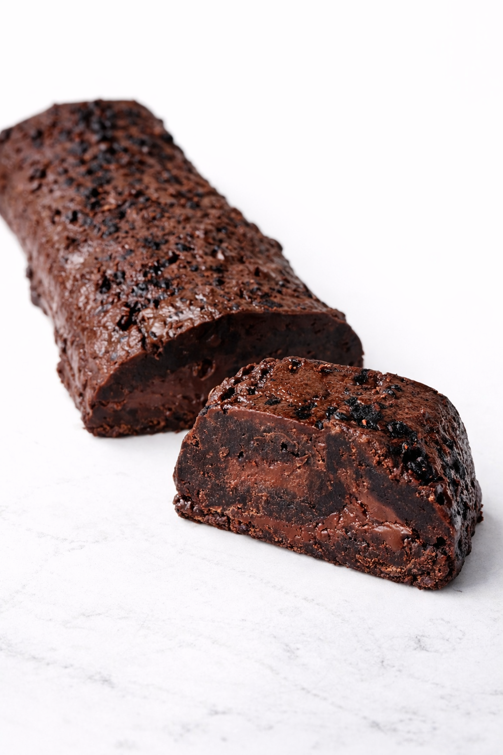 This Brownie Yule Log is made from a deep, dense, fudgy brownie, gently rolled while still soft and filled with a silky chocolate fudge that melts like a truffle. Rich cocoa, real chocolate, zero pretending to be “light.”